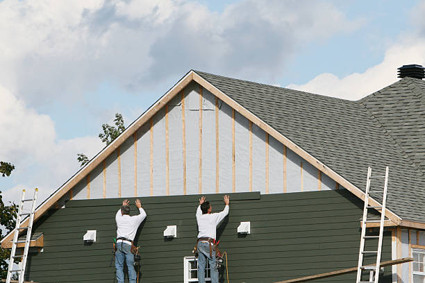Professional Siding Installation technician working in Eaton, CO